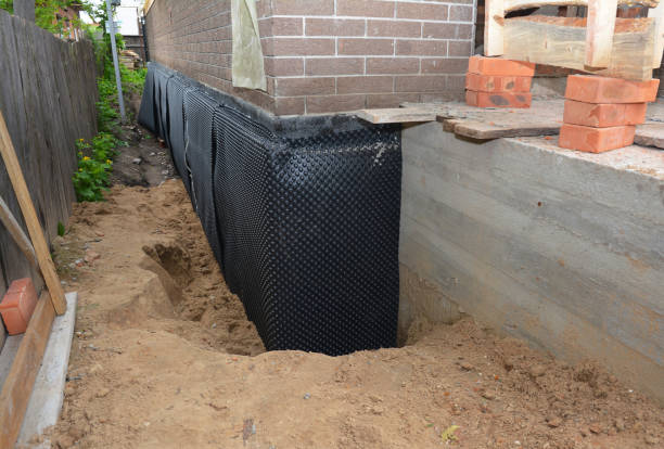 Happy homeowners after waterproofing job in Callaway